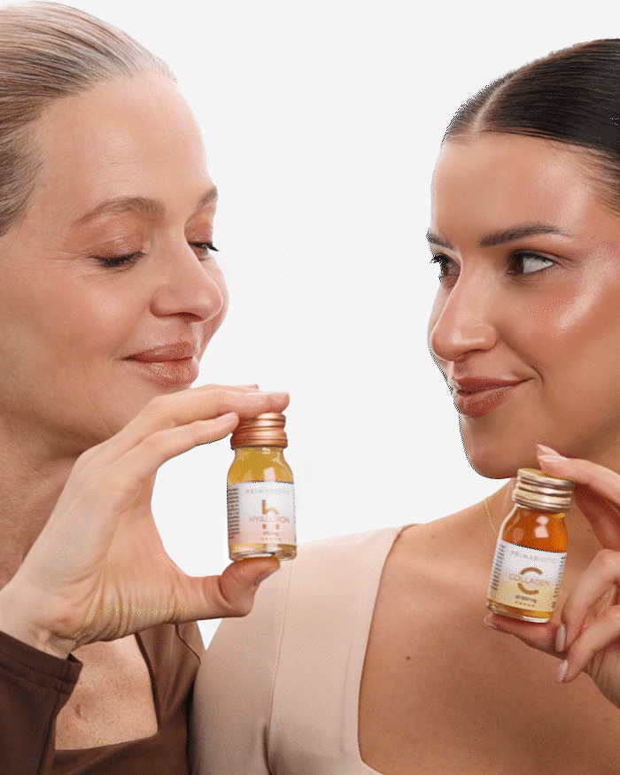 Gif - dwie kobiety stukają się buteleczkami z kolagenem do picia Primabiotic Collagen i kwasem hialuronowym do picia Primabiotic Hyaluron